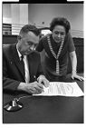 Mayor West signing a proclamation 